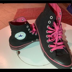 Black and pink high top converse